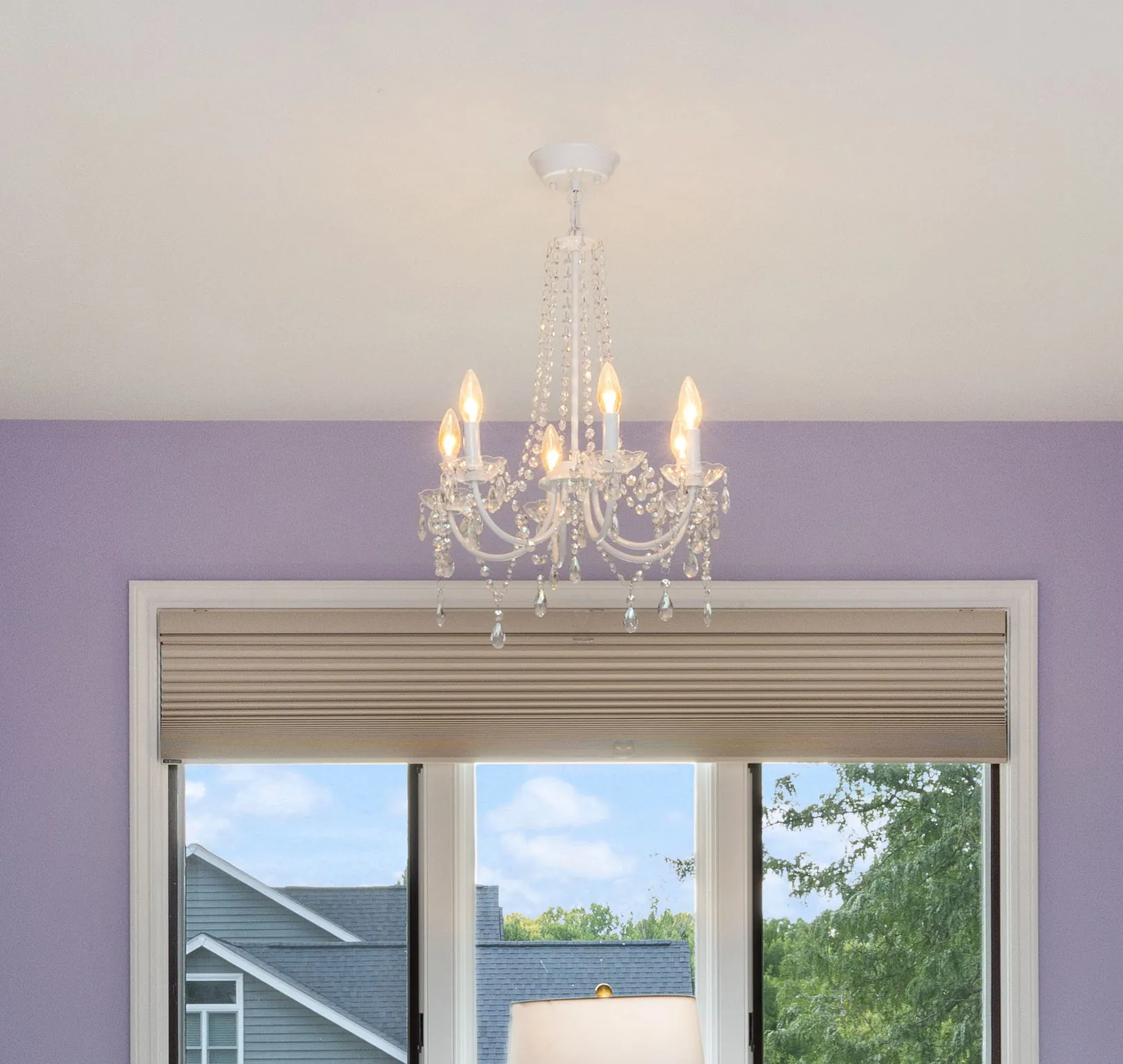 Crystal chandelier in a lavender bedroom